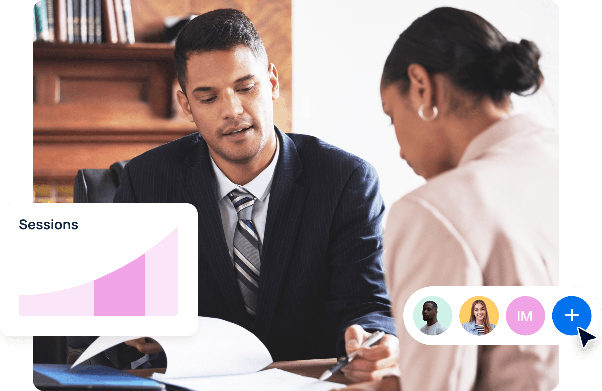 An image of two people reviewing a printed copy of a law firm marketing report