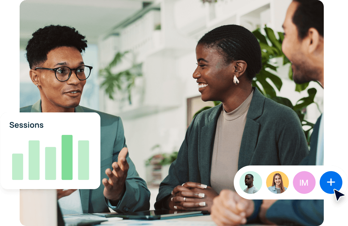 An image of three people from a marketing agency reviewing the unified marketing analytics inside AgencyAnalytics